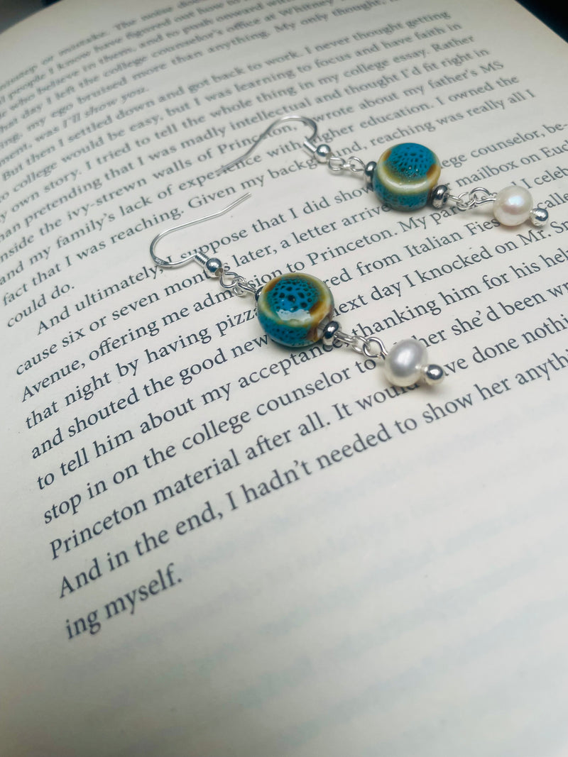 Handmade MAYIA earrings with blue ceramic bead and pearl on sterling silver hooks